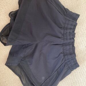 Athleta XS black racer run shorts 4 inches